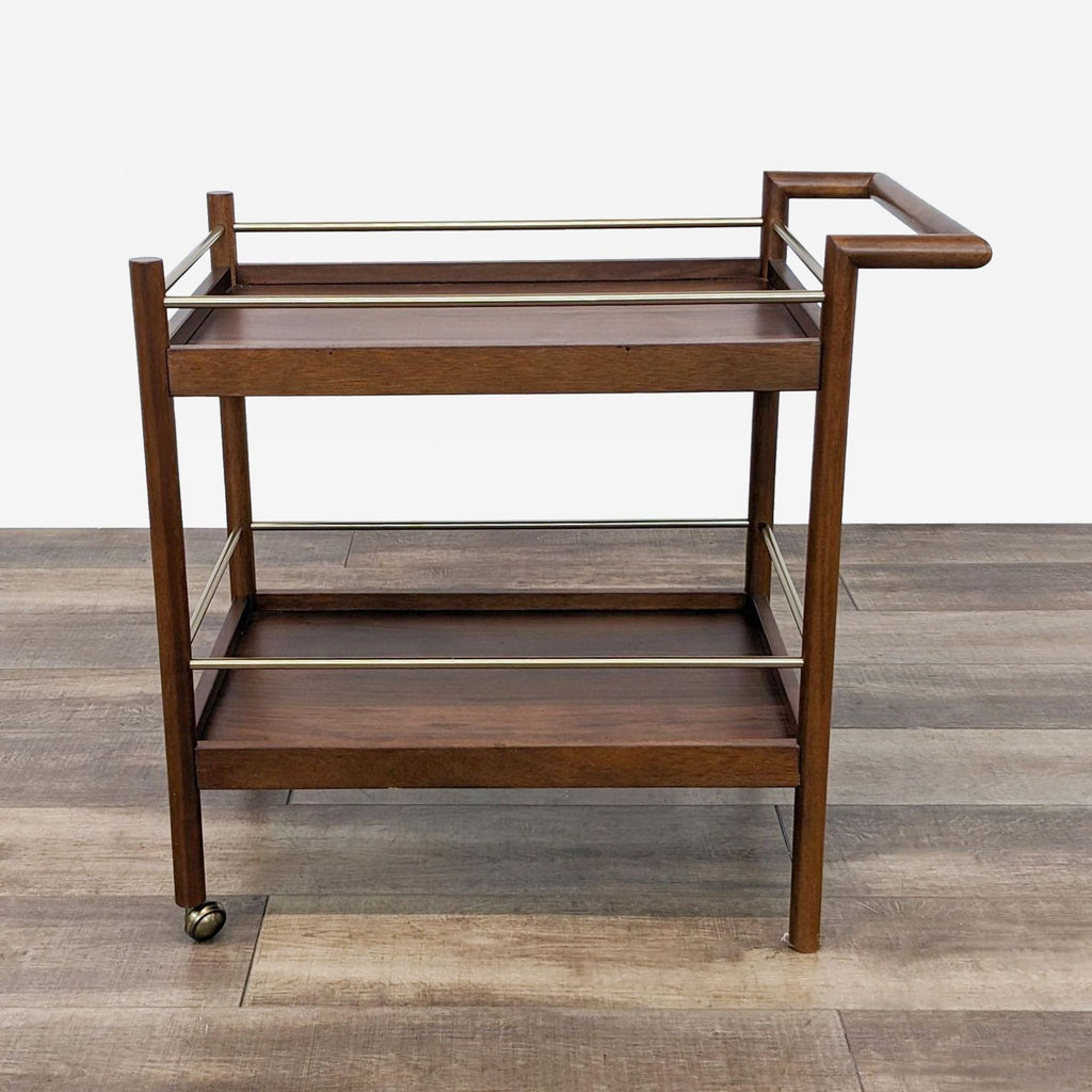 a mid century modern walnut and walnut rolling cart.