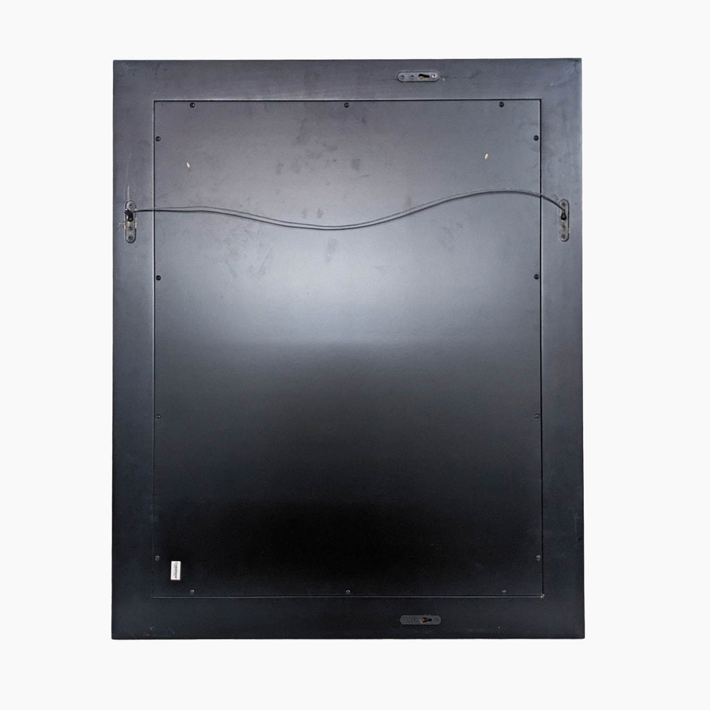 a black metal door with a metal frame.