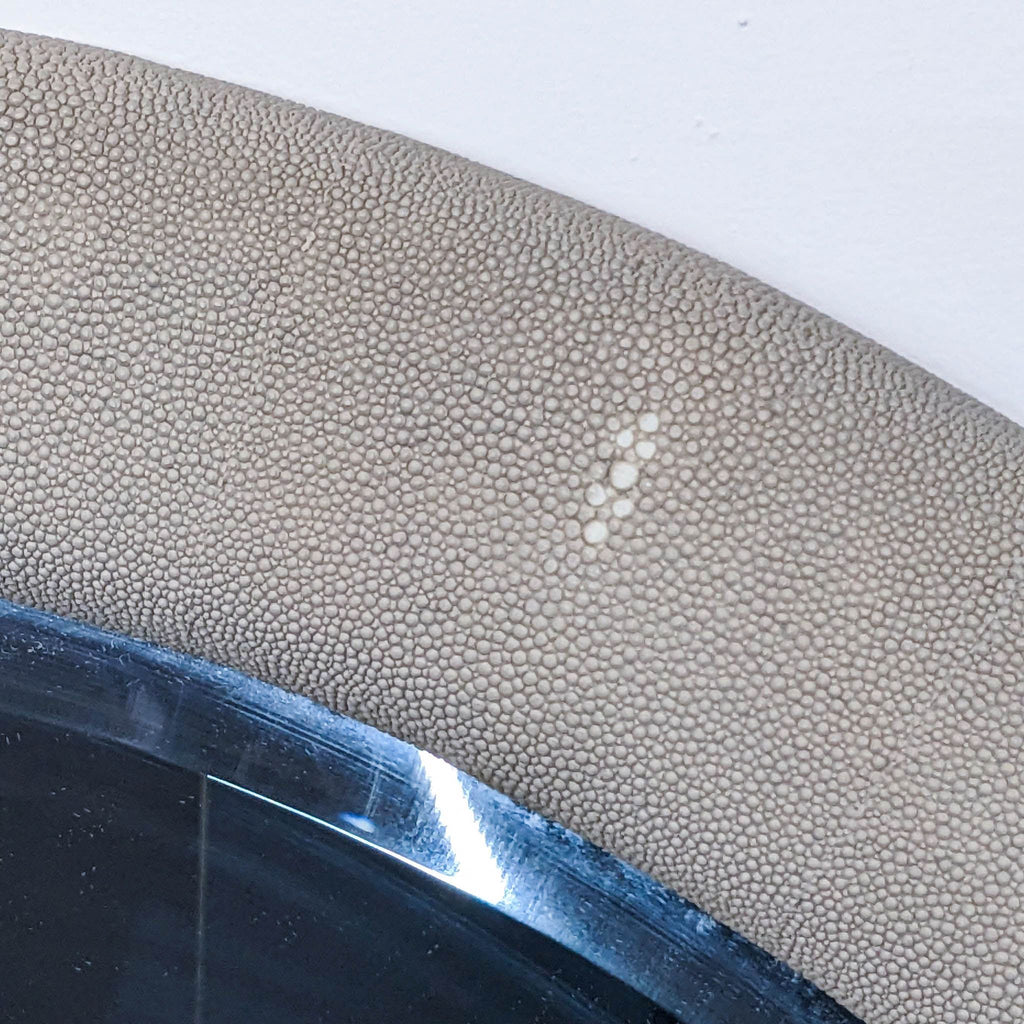 a close up of a metal plate with a pattern of white dots on it.