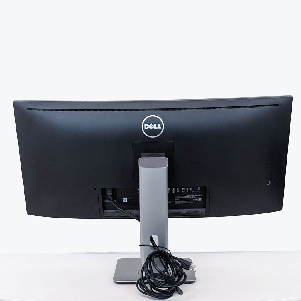 a dell monitor is shown with a black base.