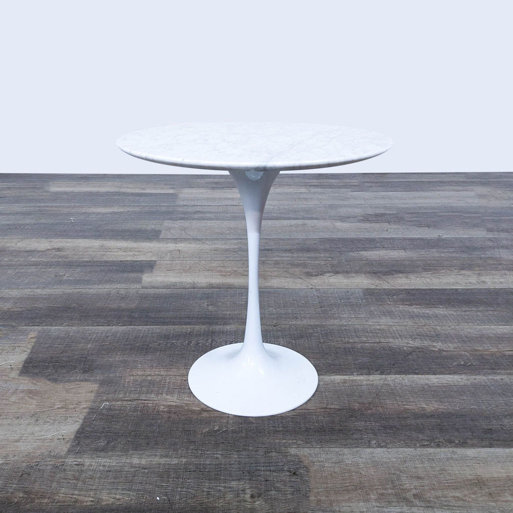 a [ unused0 ] table with a white marble top.