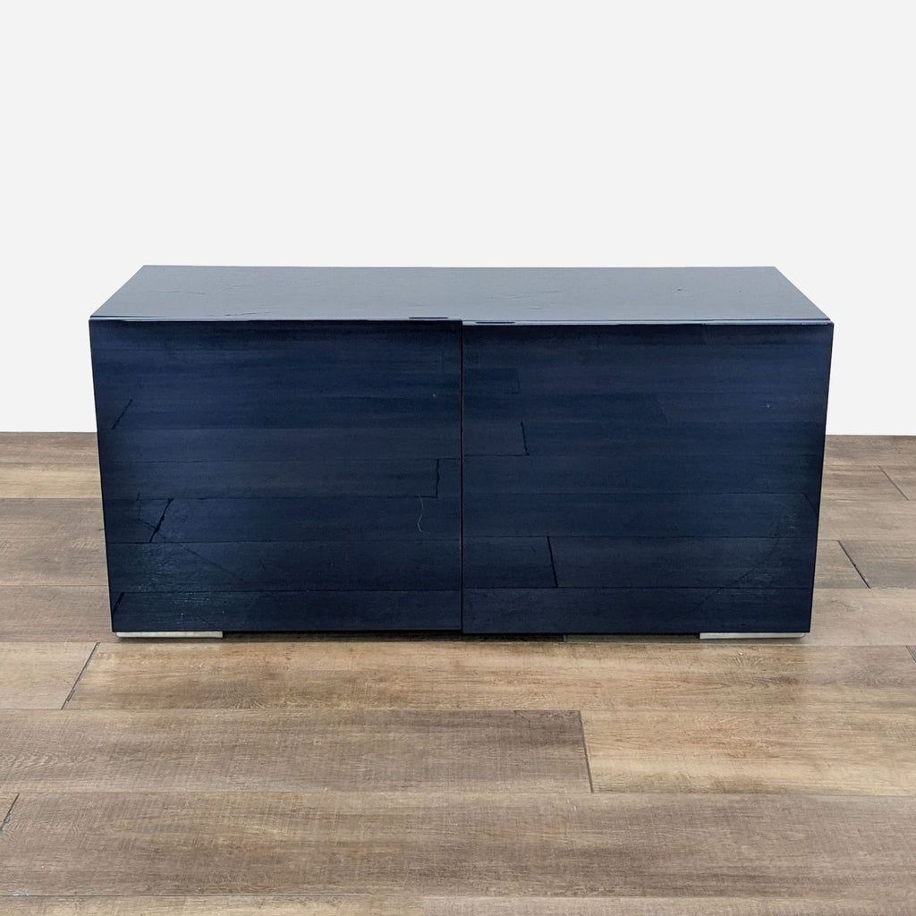 a mid century modern sideboard with a dark blue finish.