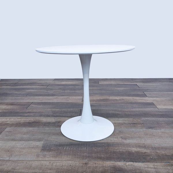 a white pedestal table by [ unused0 ] for [ unused0 ], 1970s