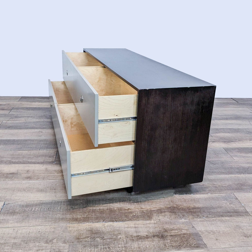 the [ unused0 ] chest is made of solid wood with a black finish.