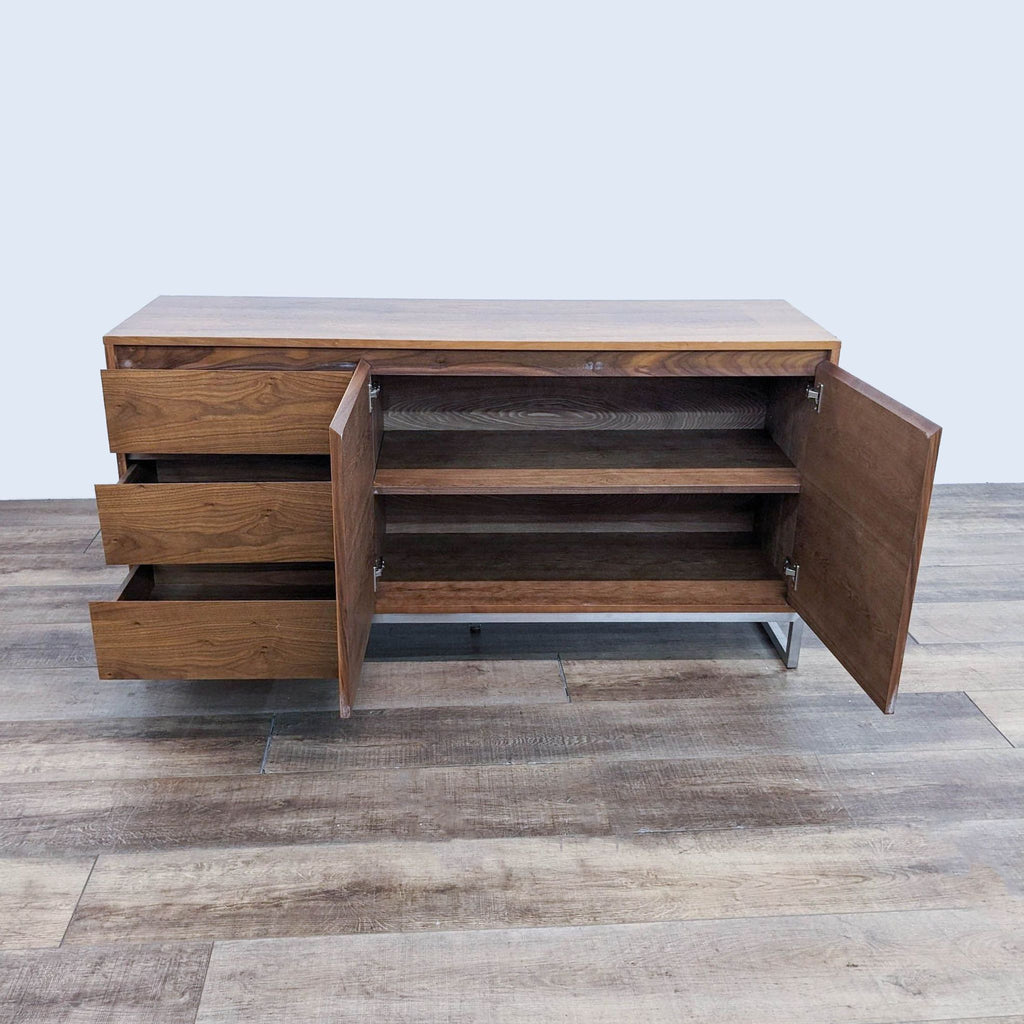 Open view of the Gus dresser, showing drawers and adjustable shelf storage.