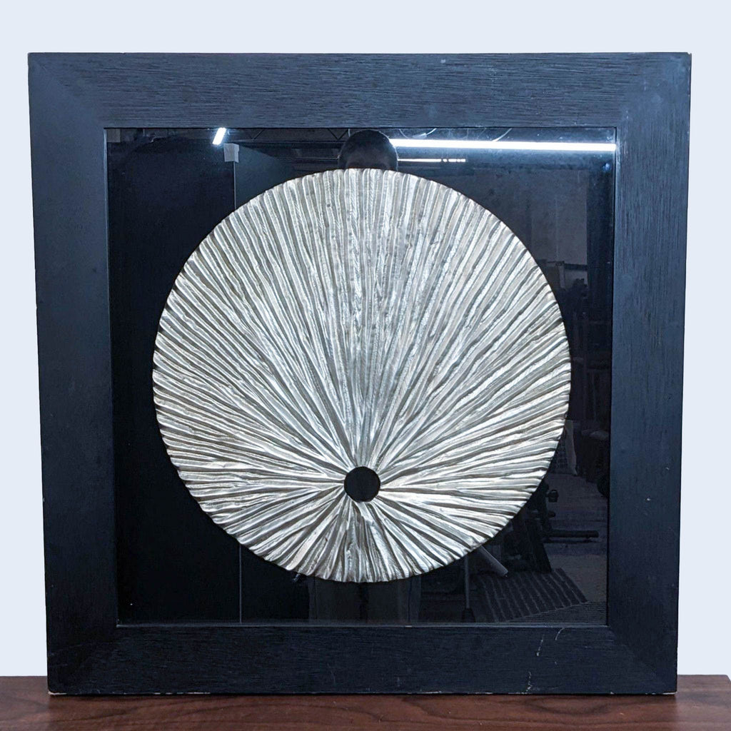 a large metal sculpture of a sunburst