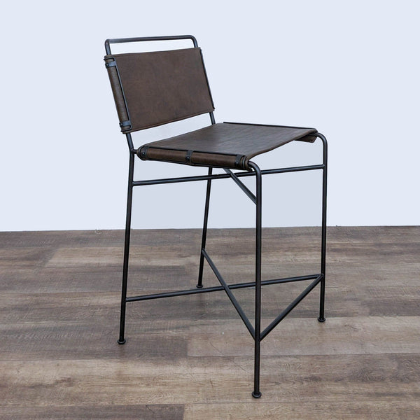 the [ unused0 ] bar stool is a contemporary design with a leather seat and a metal frame
