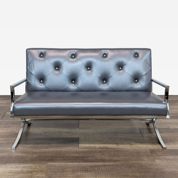 a chrome and leather sofa by [ unused0 ] for [ unused0 ].