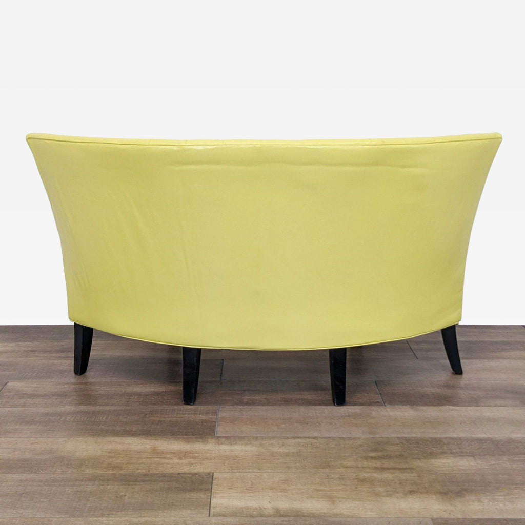 a yellow sofa by [ unused0 ]