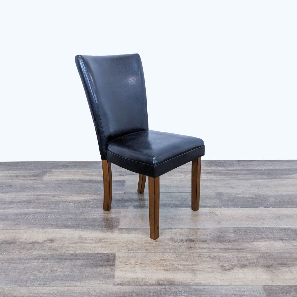 the [ unused0 ] - black leather dining chair