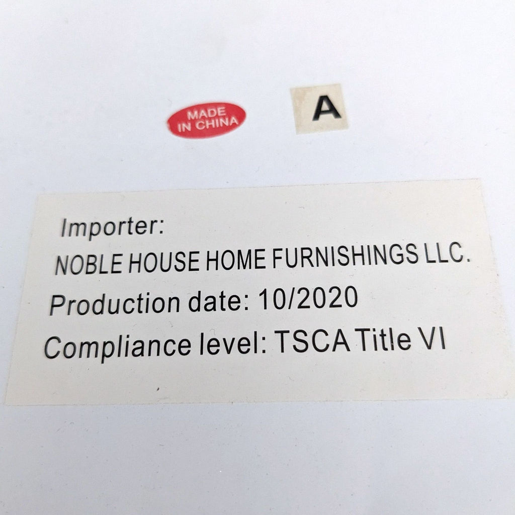 a label on the back of a book showing the name of the company's name and date