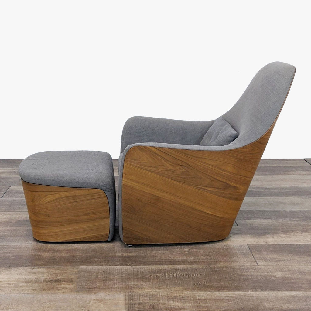 a pair of lounge chairs by [ unused0 ].