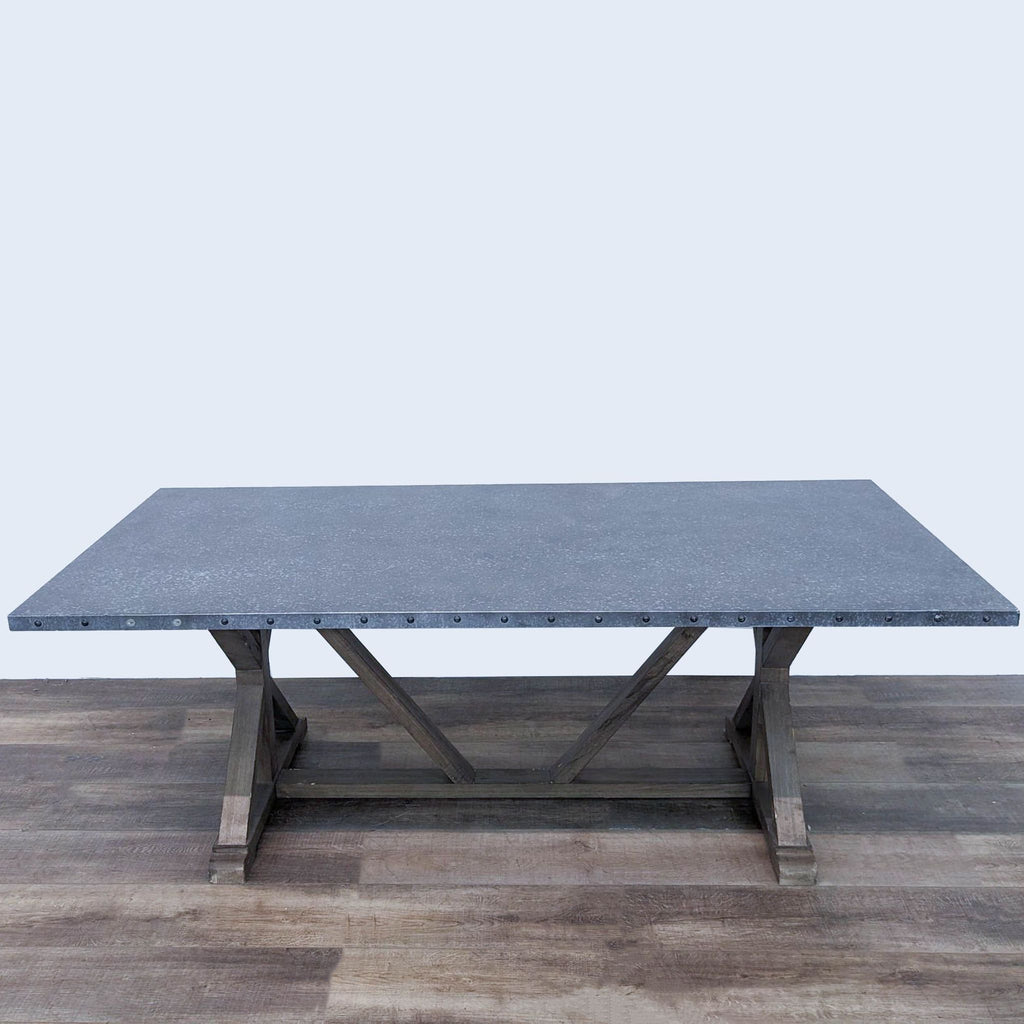 a concrete table with a steel frame.