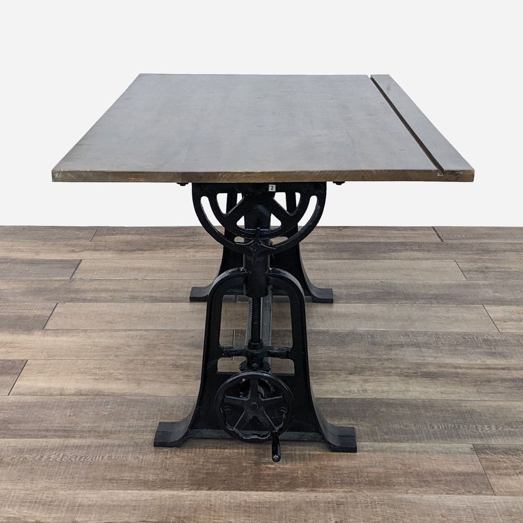 a vintage cast iron table with a cast iron base.