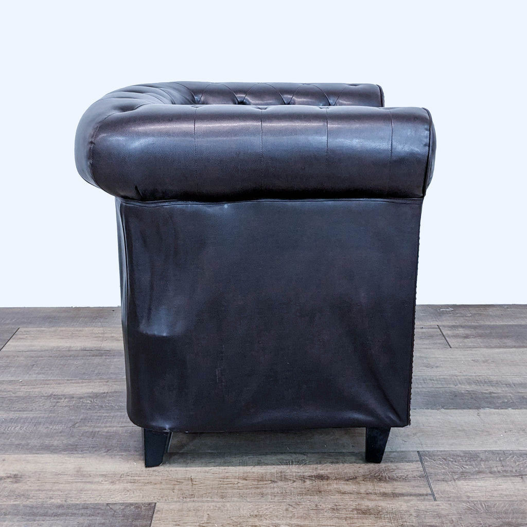 a leather chair with a cushion