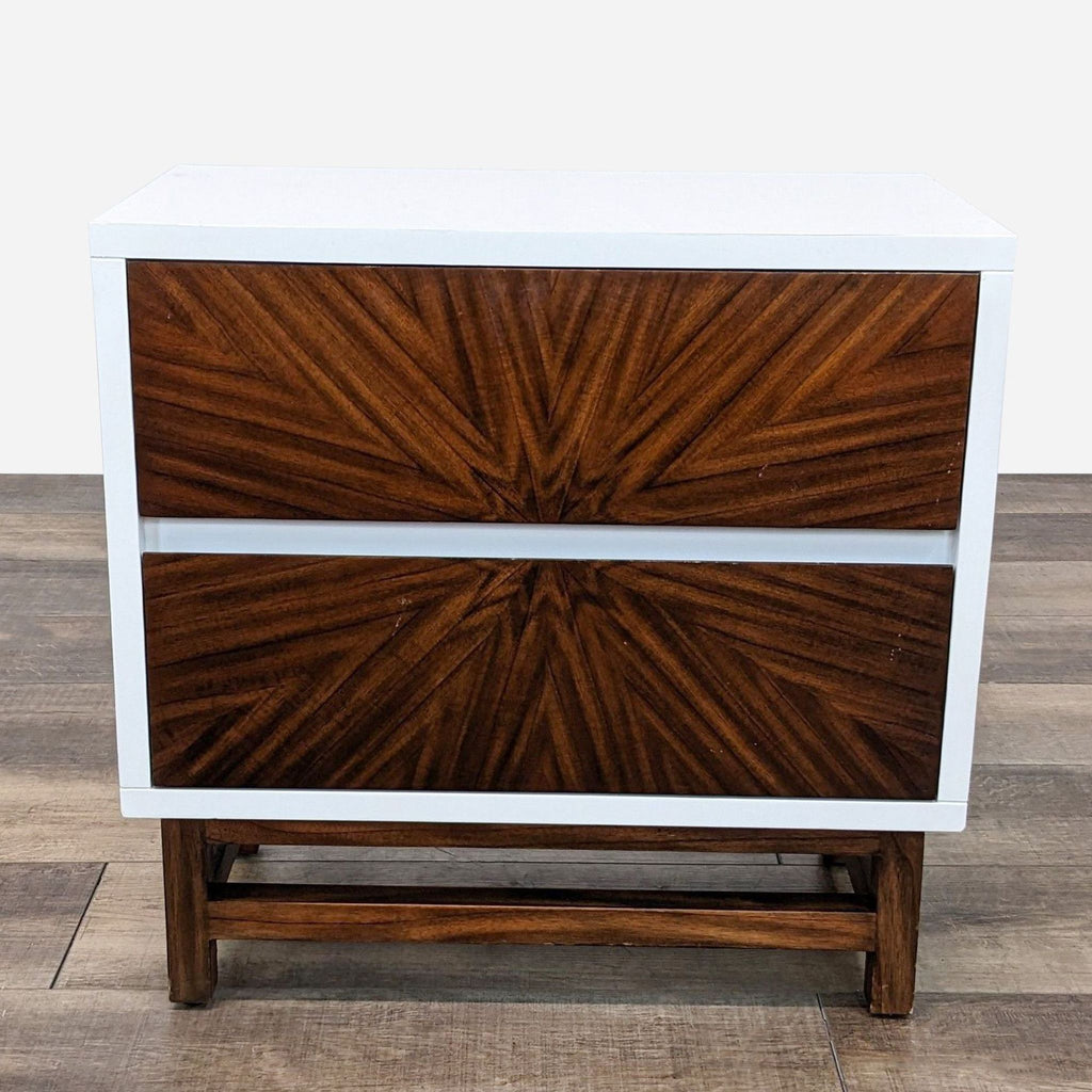 a mid century modern dresser with a geometric design.