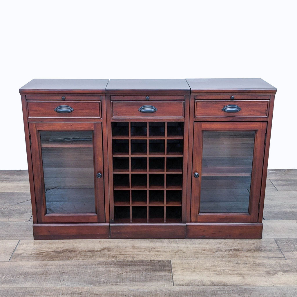 the wine cabinet is made of solid wood with a dark brown finish. the wine cabinet has a