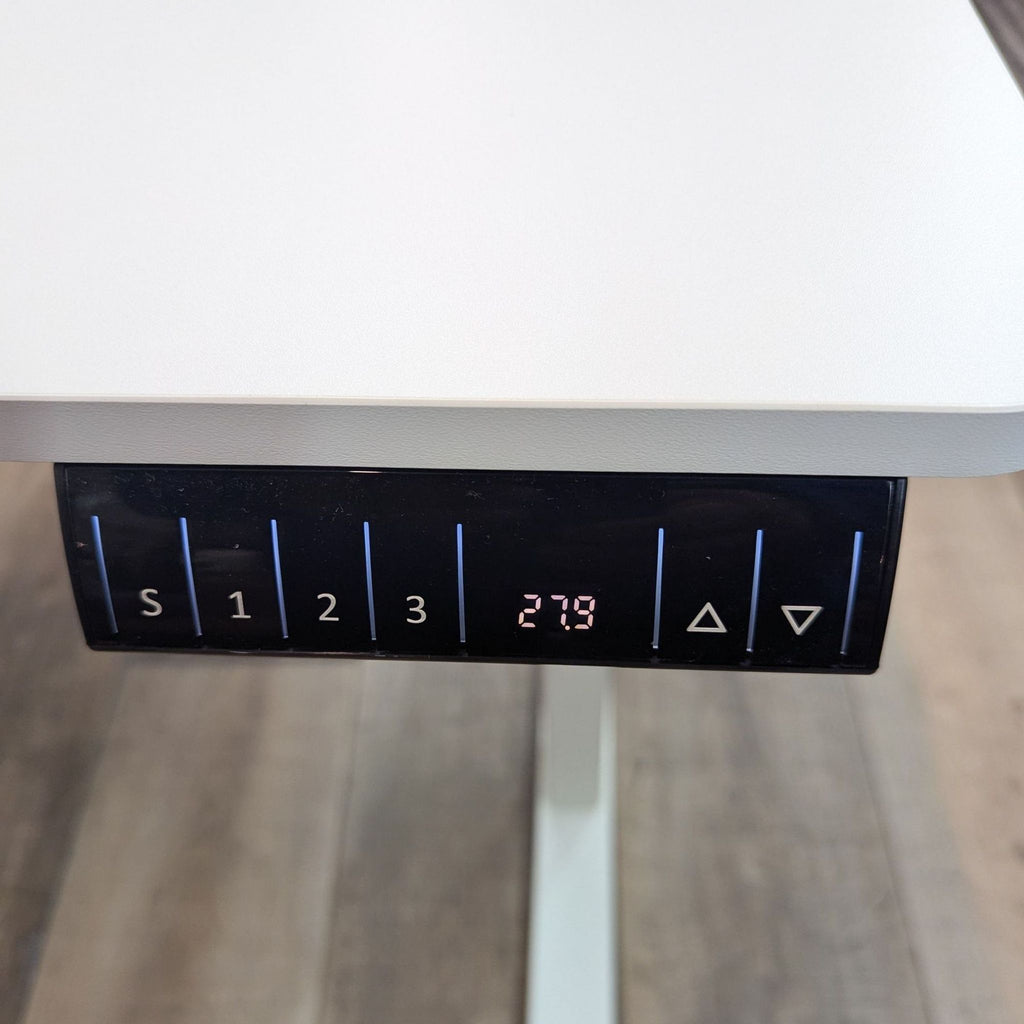 the back of the desk is a white table top with a white table top.