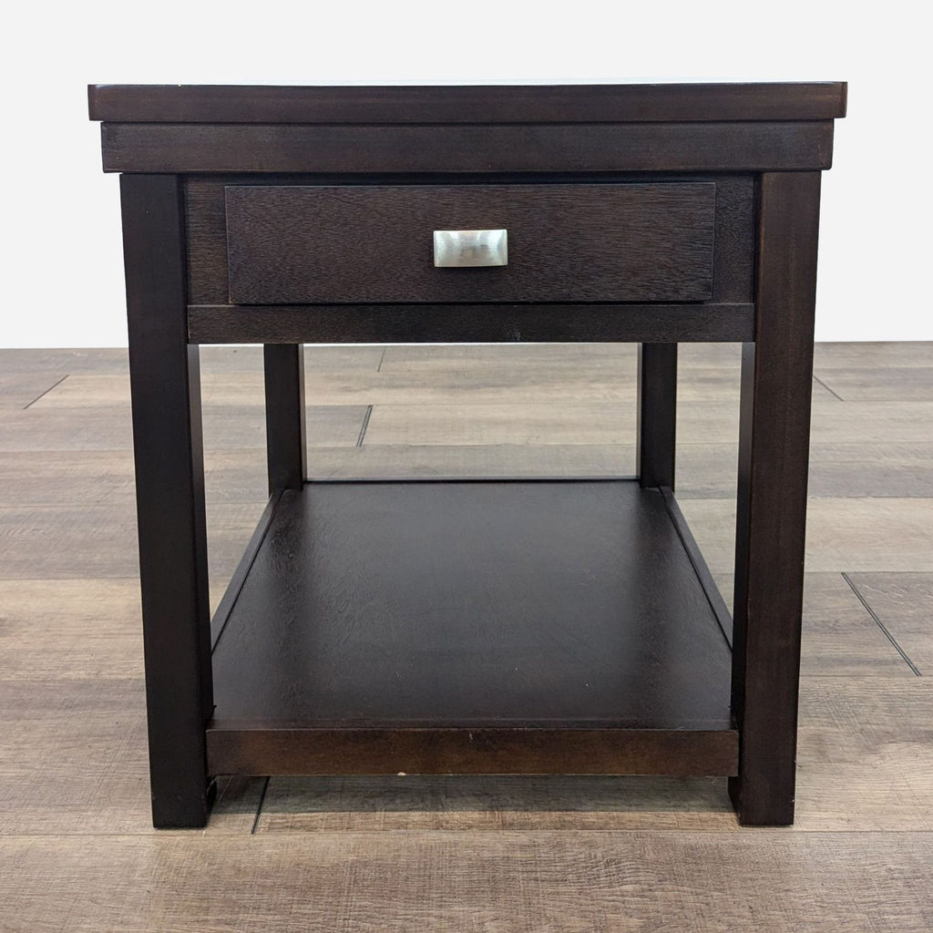 a dark wood end table with a shelf