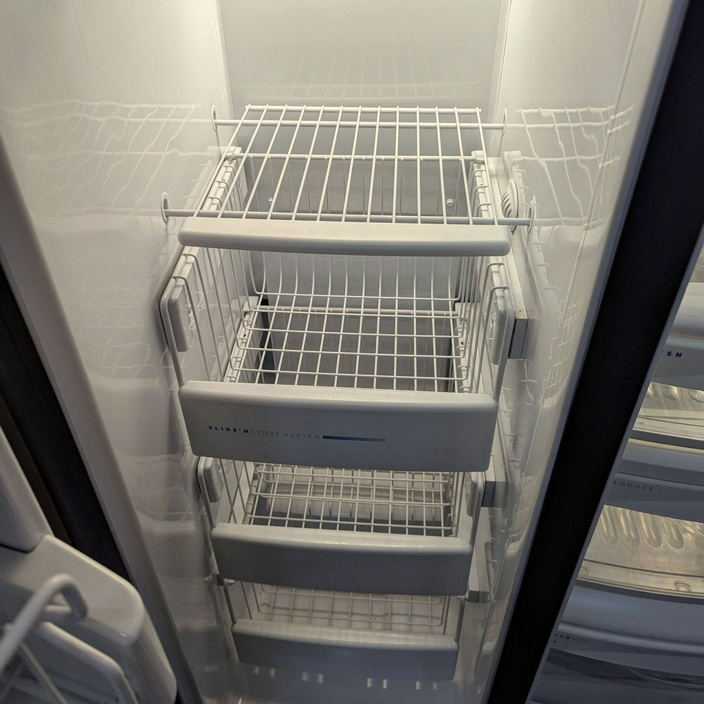 a refrigerator with three shelves in it.