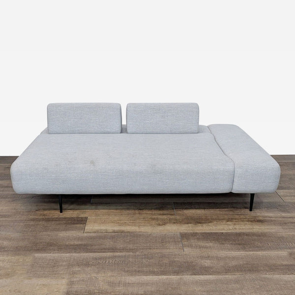 sofa in a modern style with a black metal frame.