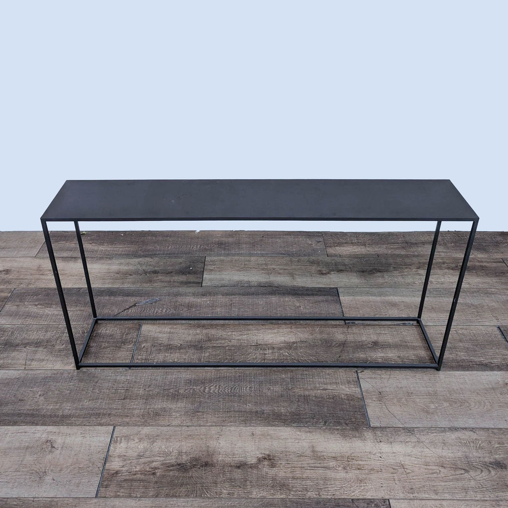 the coffee table is a modern coffee table with a black metal frame.