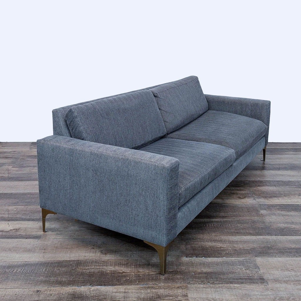 sofa is a modern sofa design with a modern twist. the sofa is made of a dark grey