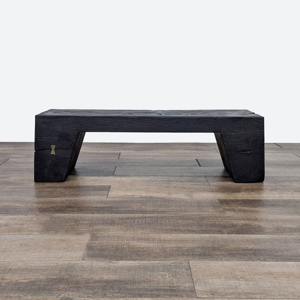 the [ unused0 ] bench is made of solid wood and is made from a black stone.