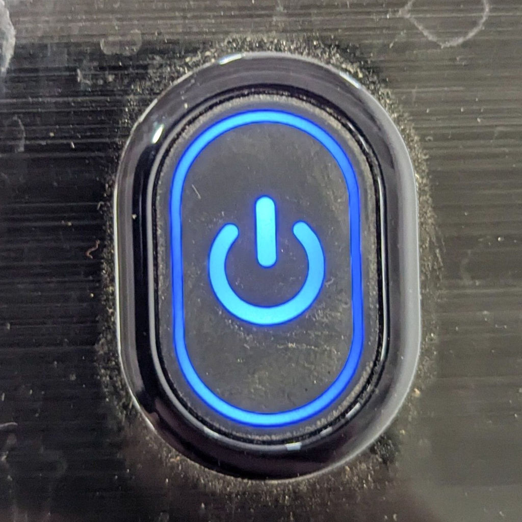 a blue power button on a black background.