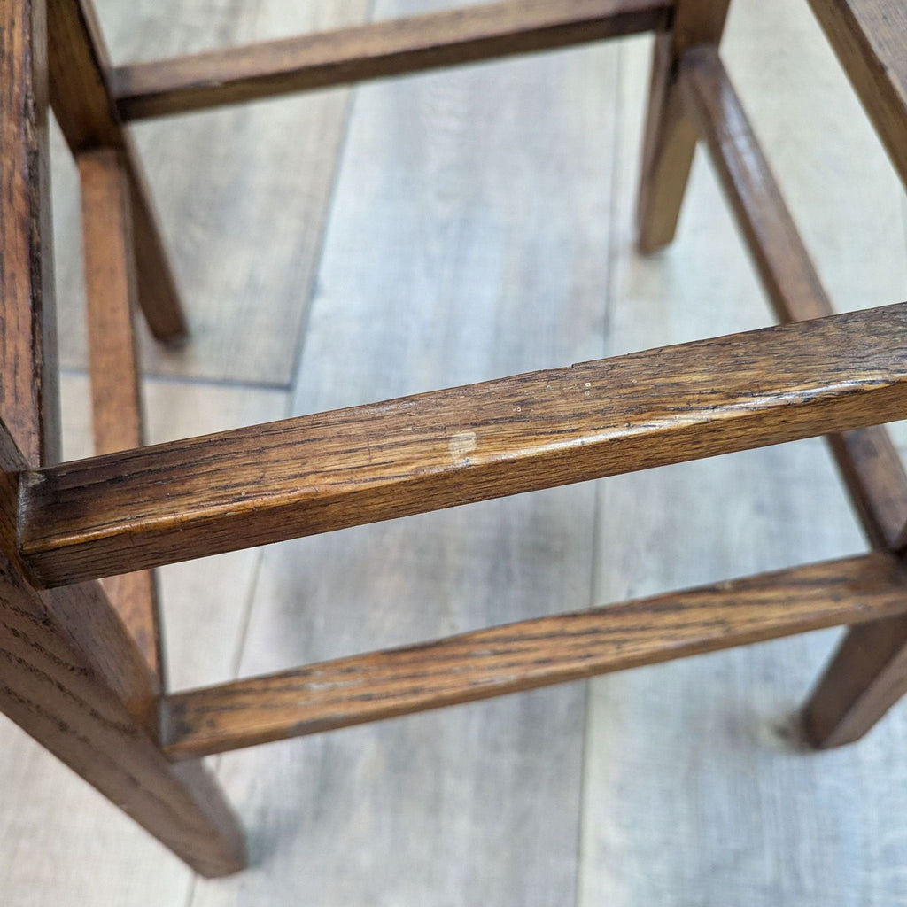 a pair of antique english oak stools