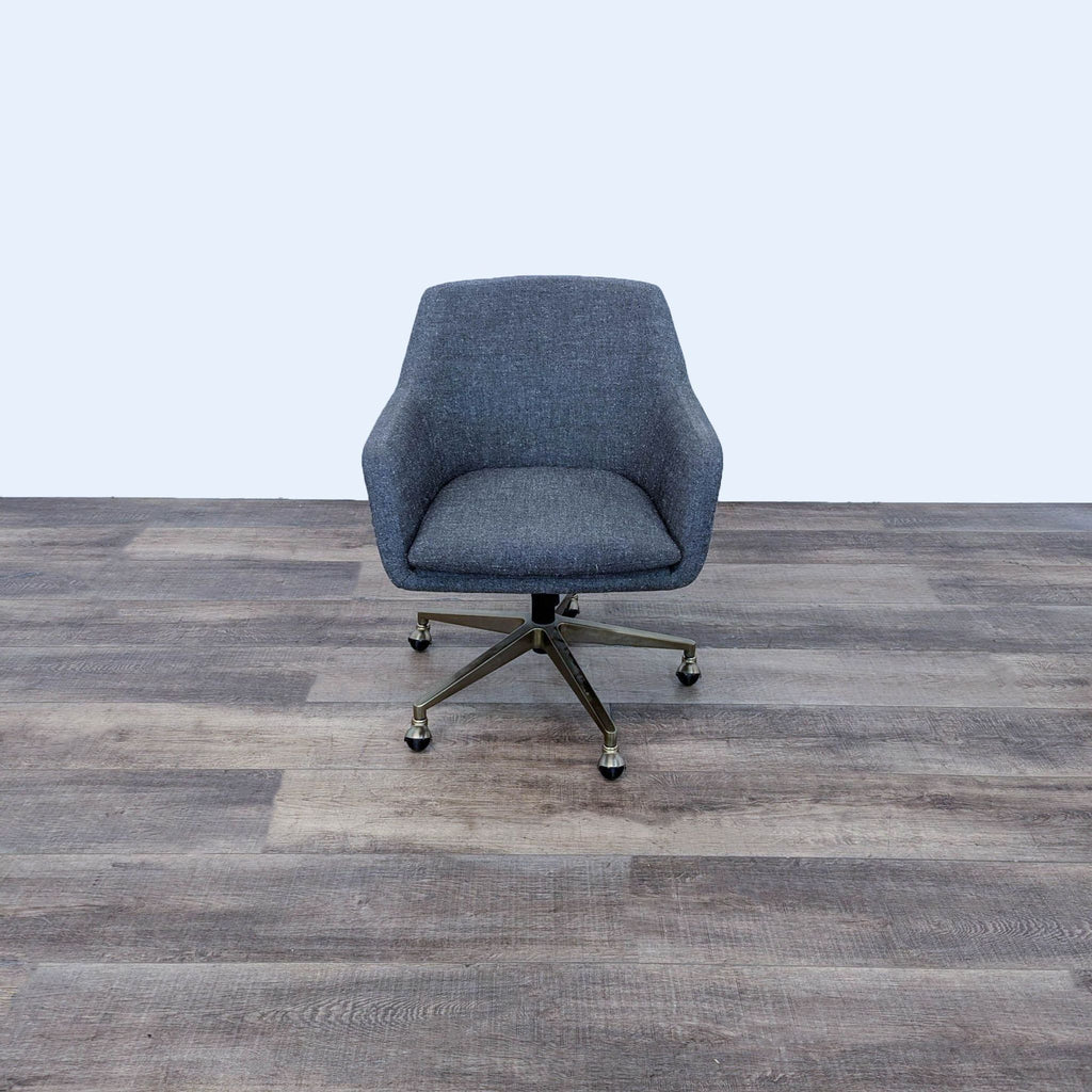 Front view of West Elm Helvetica Office Chair with gray upholstery and metal base.