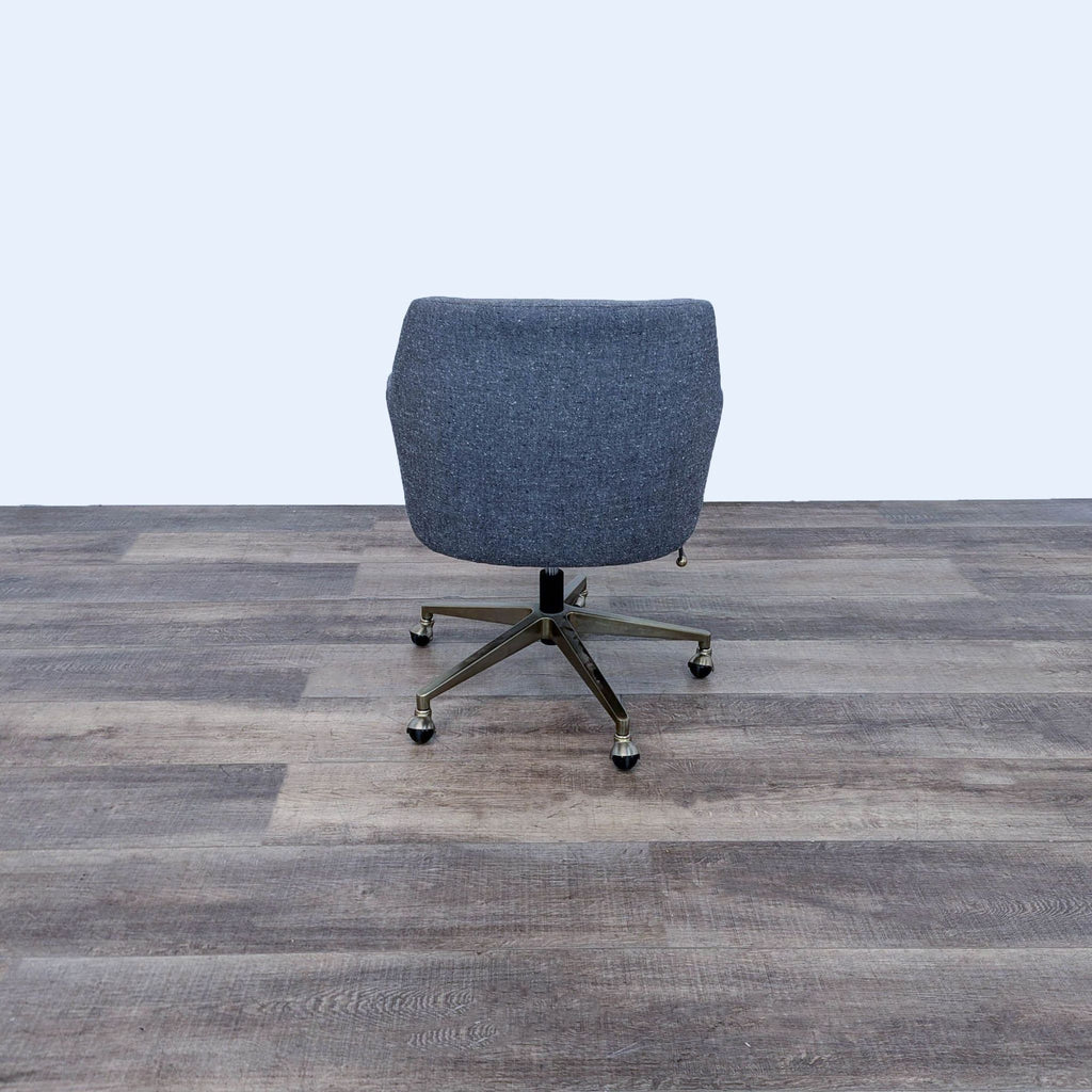 Rear view of West Elm Helvetica Office Chair highlighting adjustable features and sleek look.