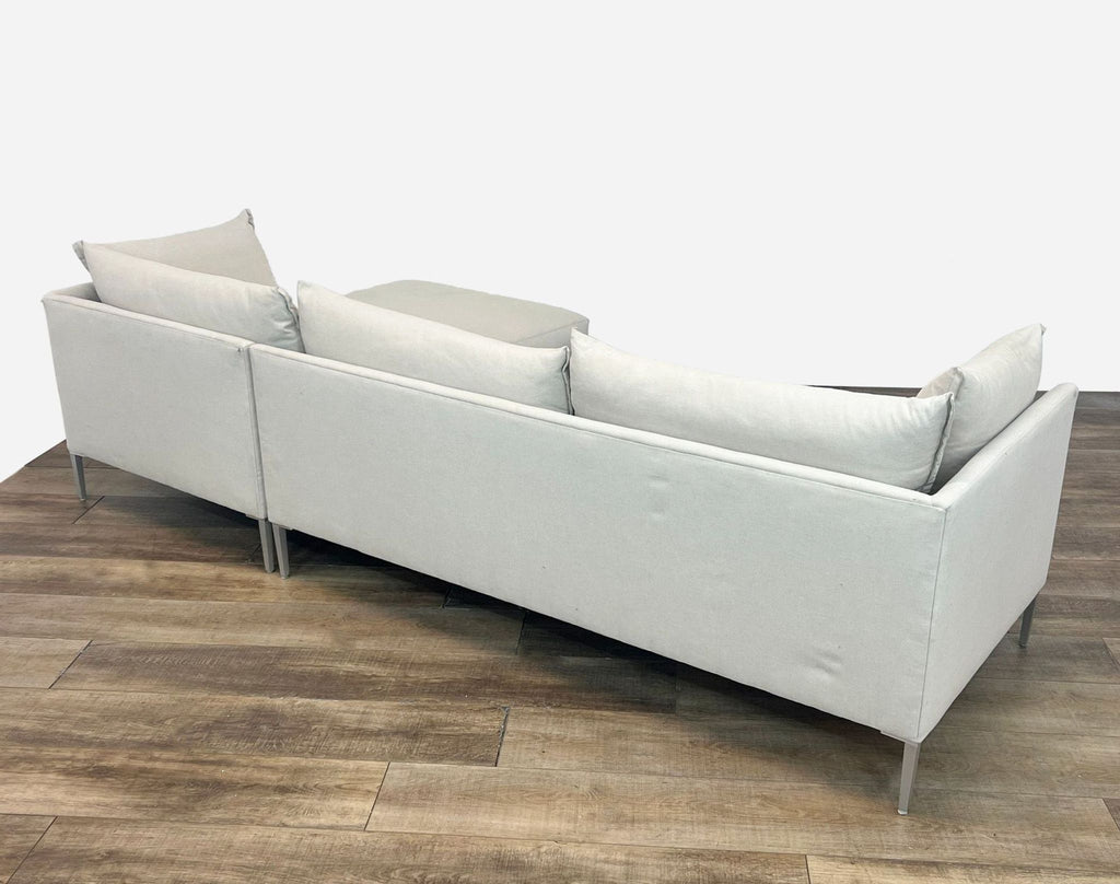 a pair of [ unused0 ] sofas in the style of [ unused0 ]