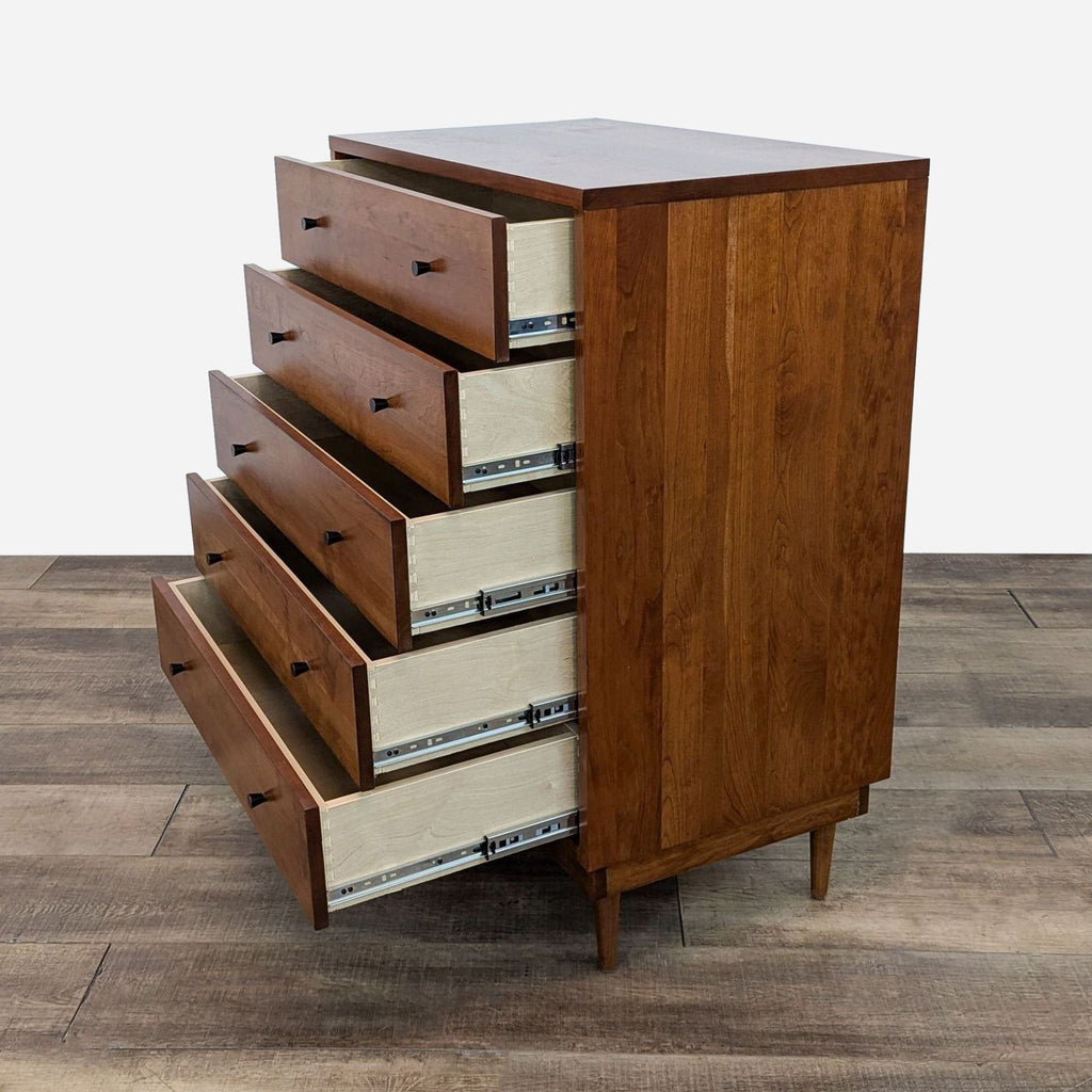 a vintage mid century modern chest of drawers