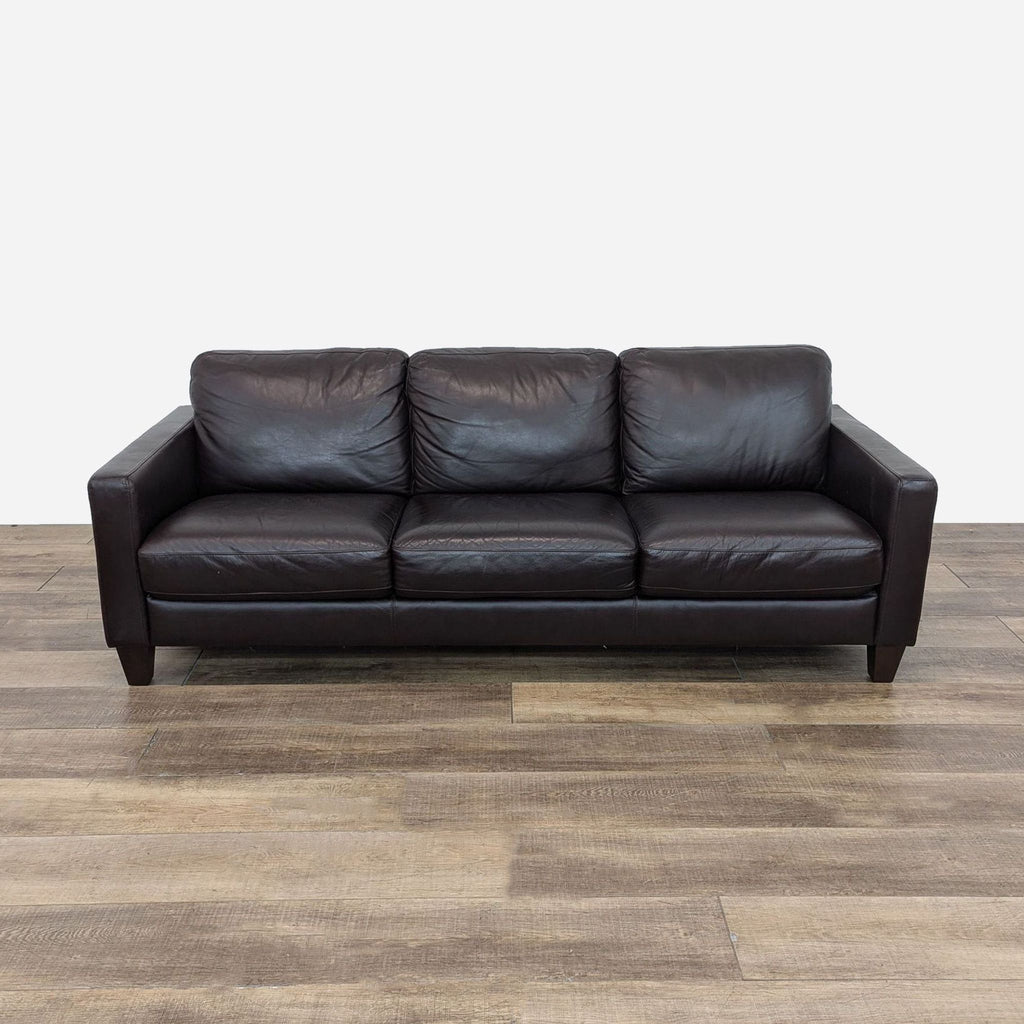 a leather sofa in a living room.
