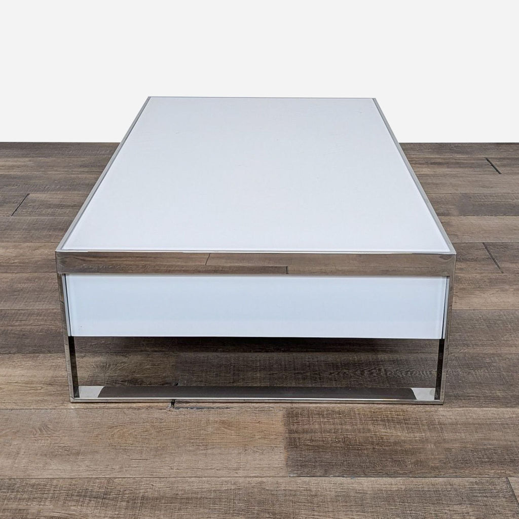 a modern coffee table with a mirrored top.