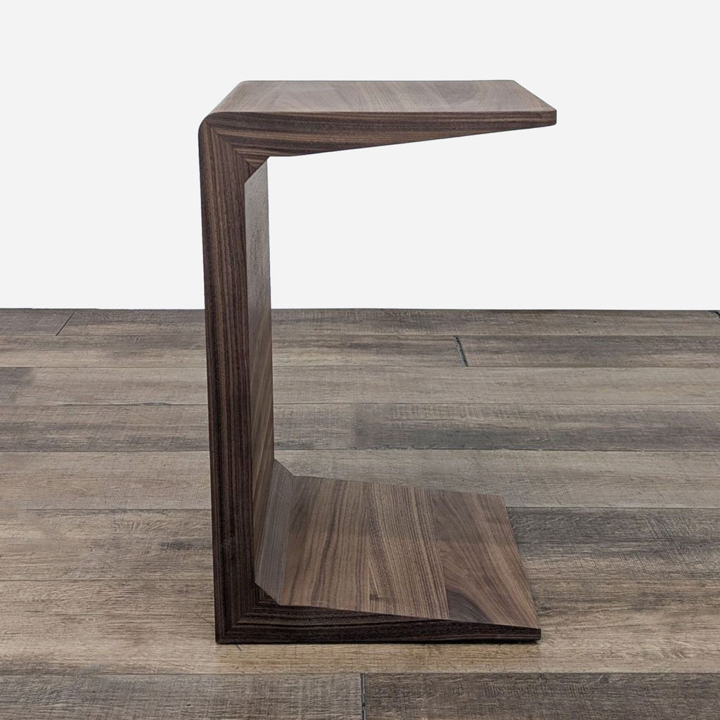 the modern side table is made from walnut and is made from walnut.