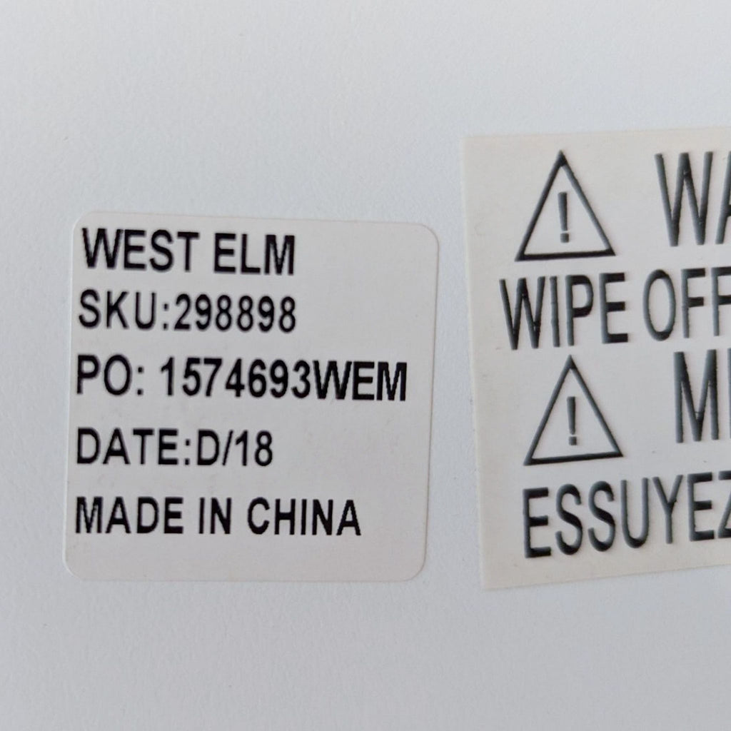 a label on a white box with a warning on it.