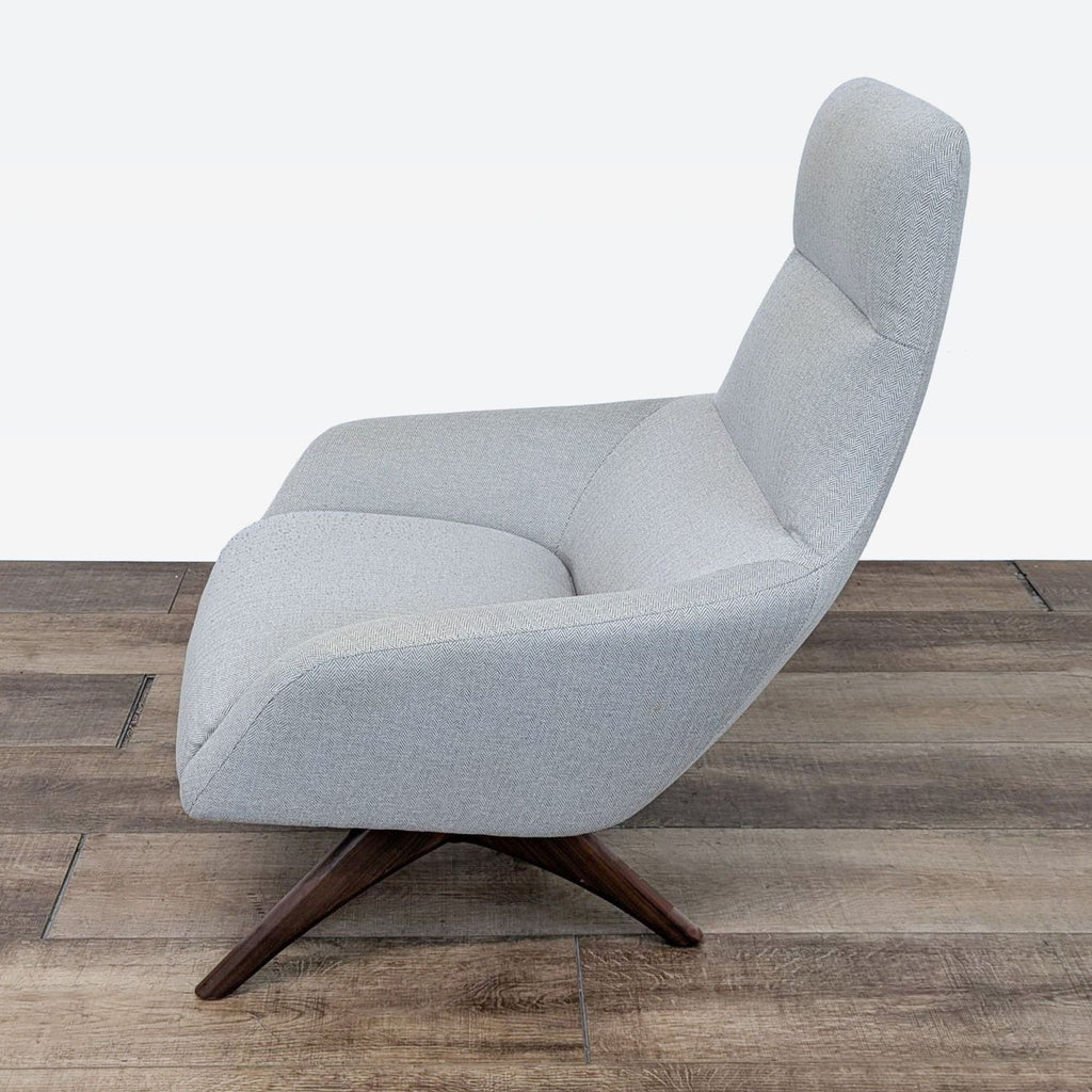 lounge chair by [ unused0 ], circa 1960s. the chair is a modern design with a