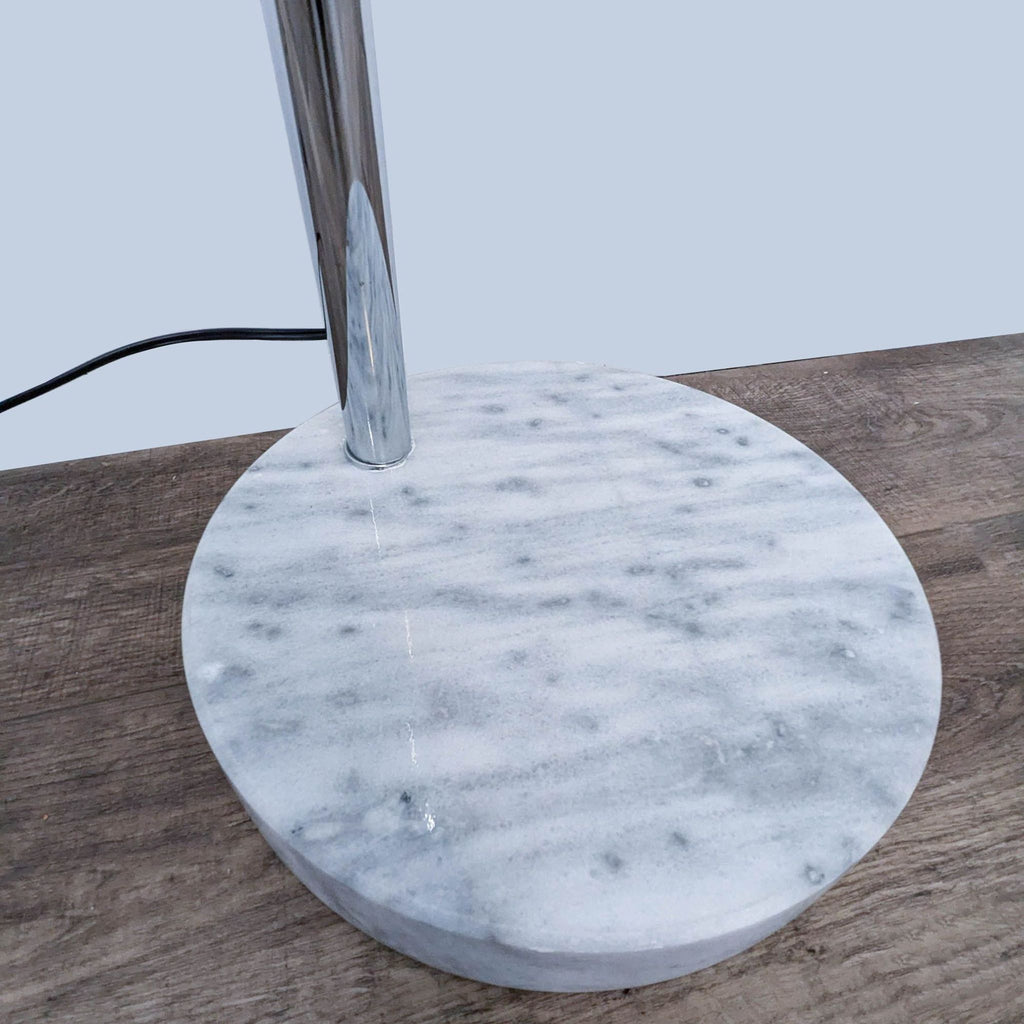 a marble table lamp with a marble base