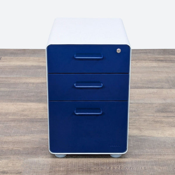 a blue and white filing cabinet with three drawers