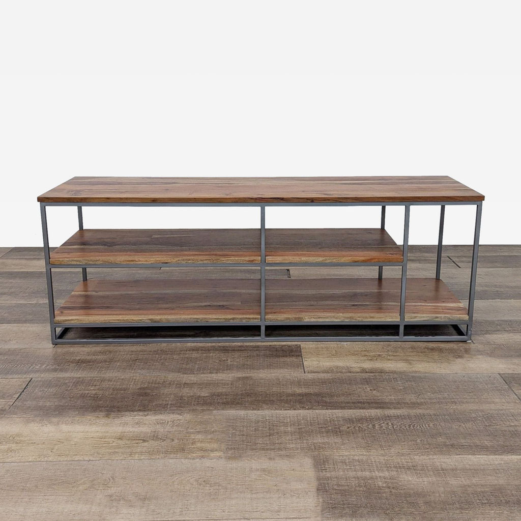 the coffee table is made from metal and has a metal frame and a metal shelf.
