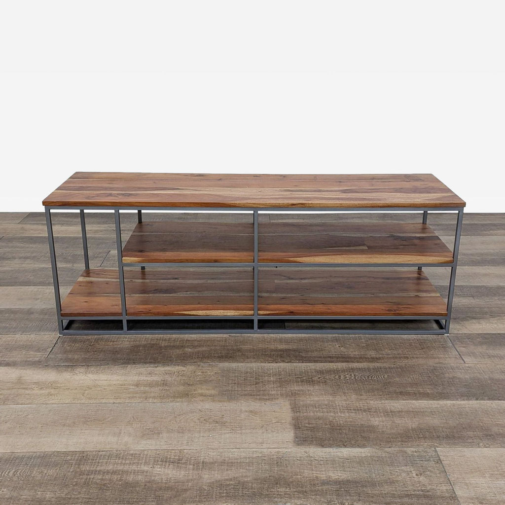 the industrial style of this coffee table is made from reclaimed wood and metal.