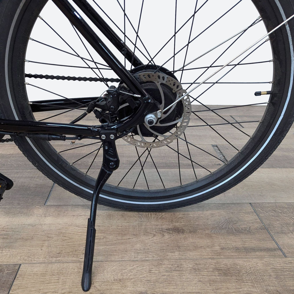 the front wheel of the bike is held up by a stand.