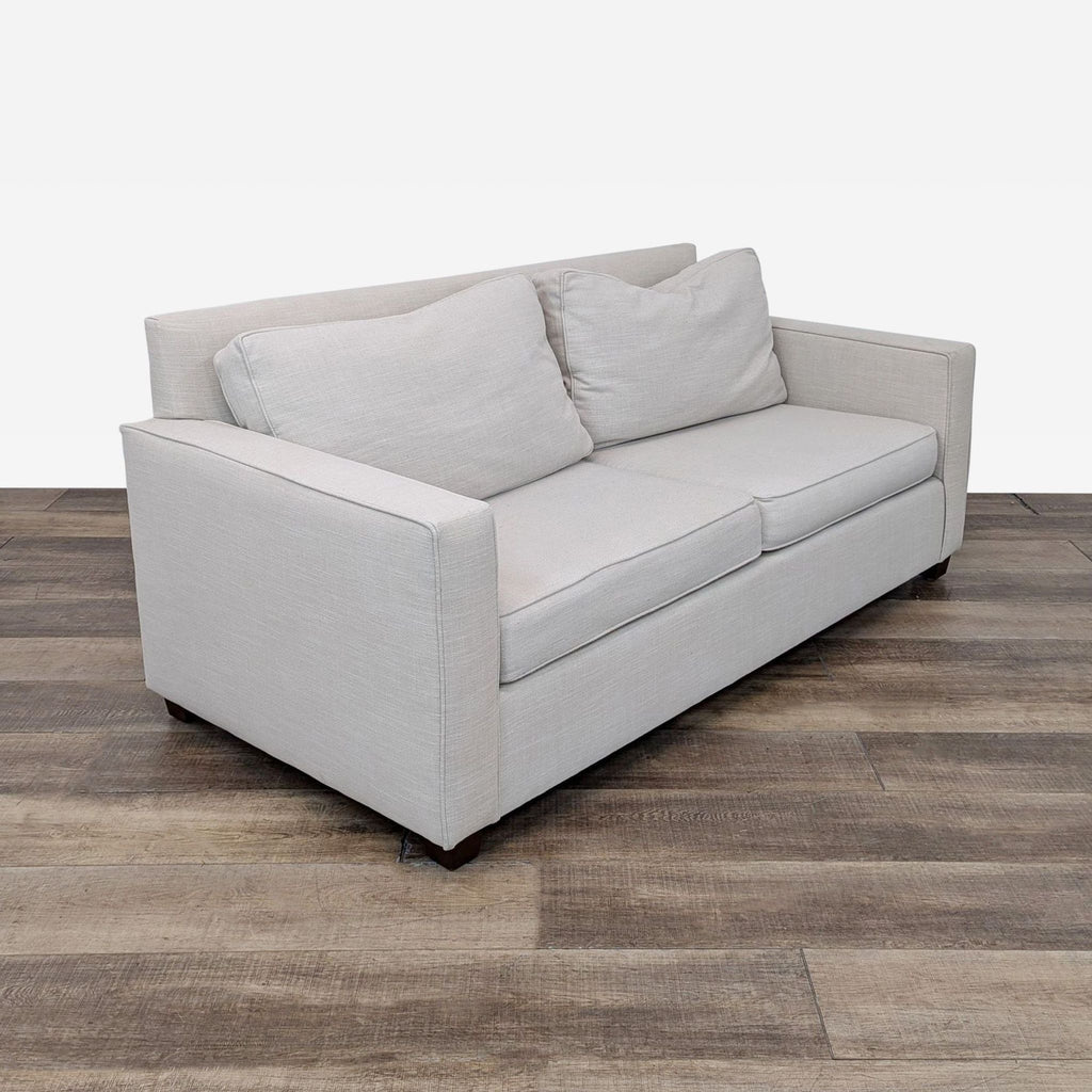 Beige Loveseat with Cushioned Seating and Wooden Legs