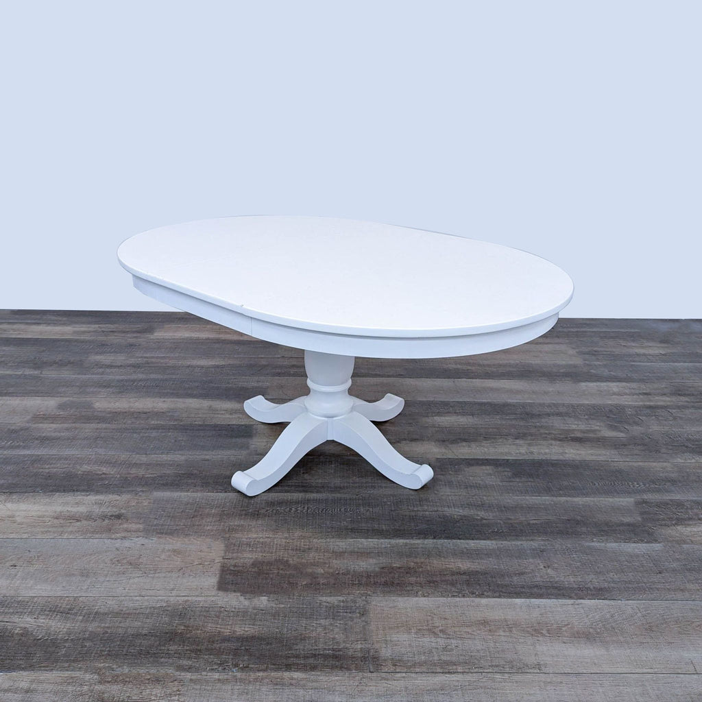 a white coffee table with a white top.