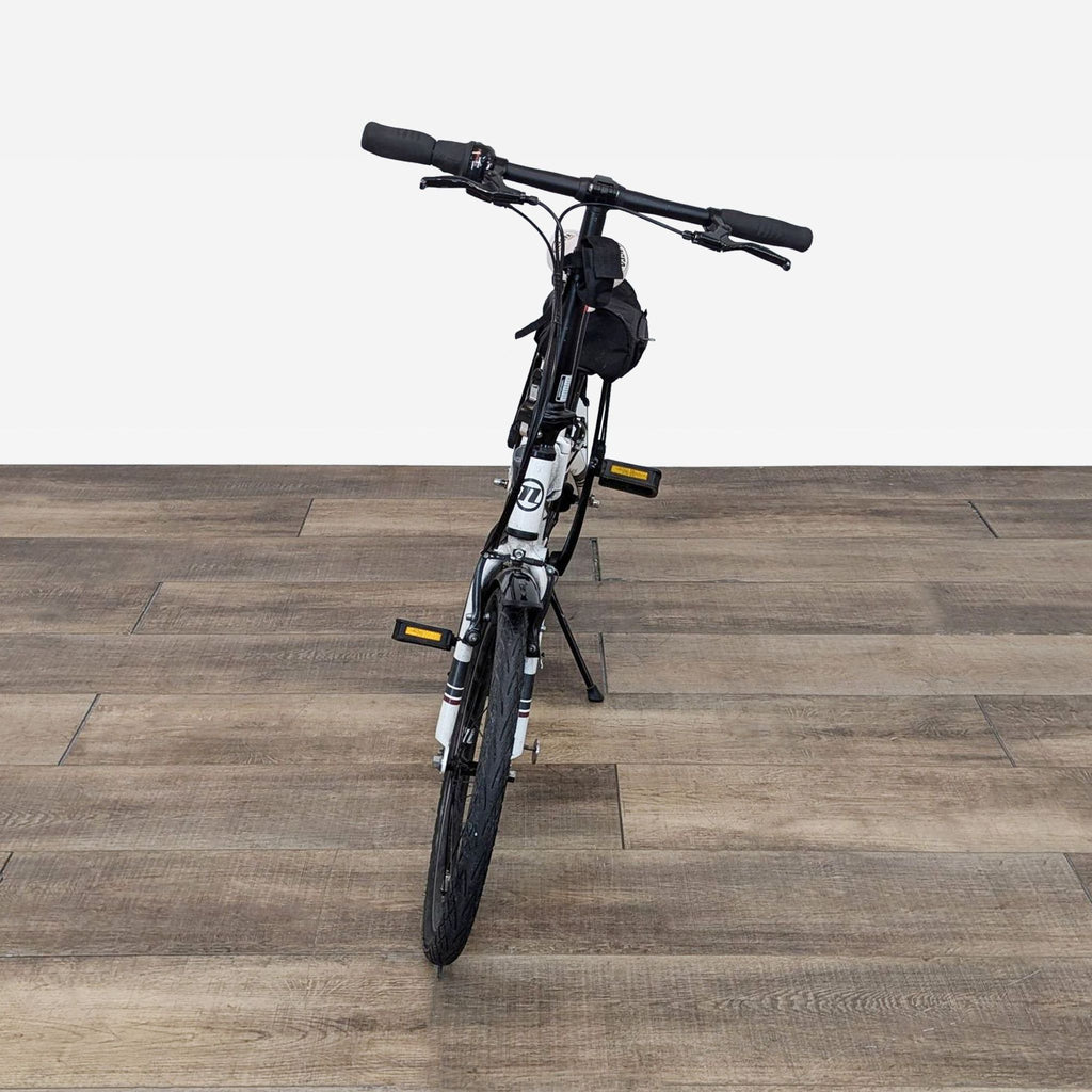 a bike on a wooden floor