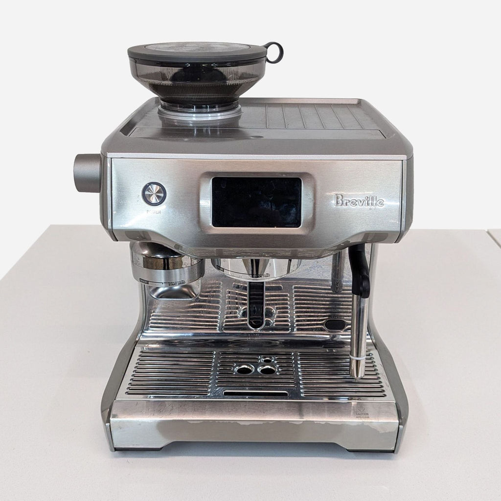 the breville espresso machine is a compact machine that can be used as a coffee machine