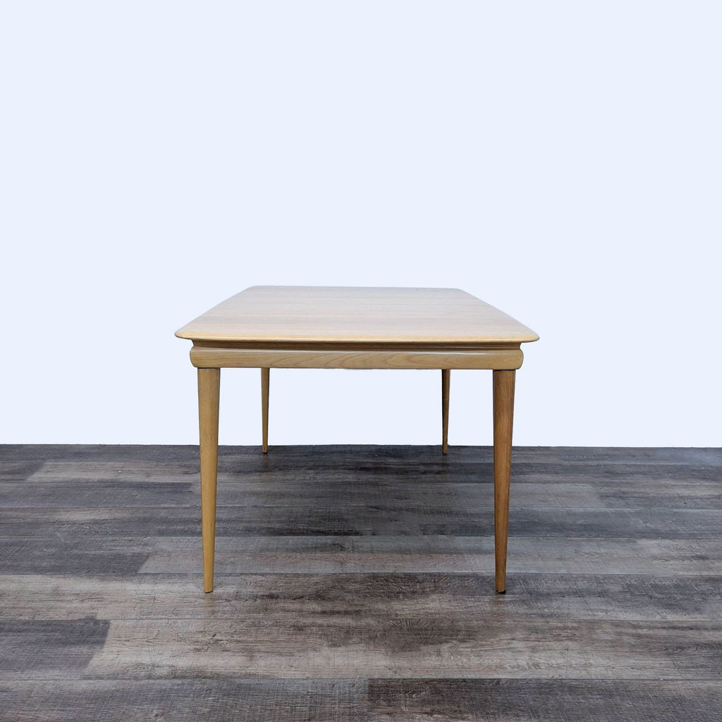 a danish modern table by [ unused0 ] for [ unused0 ]