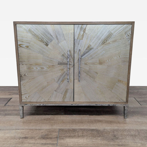 Wood cabinet by Reperch with sunburst pattern doors and metal base.